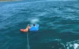 Deniz yatağıyla sürüklenen çocuğu Sahil Güvenlik kurtardı!